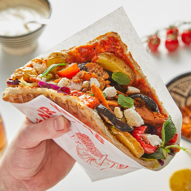 Döner kebab: This is a classic Turkish dish consisting of thinly sliced meat (usually lamb, beef, or chicken) cooked on a vertical rotisserie and then served in pita bread with salad and yogurt sauce. 