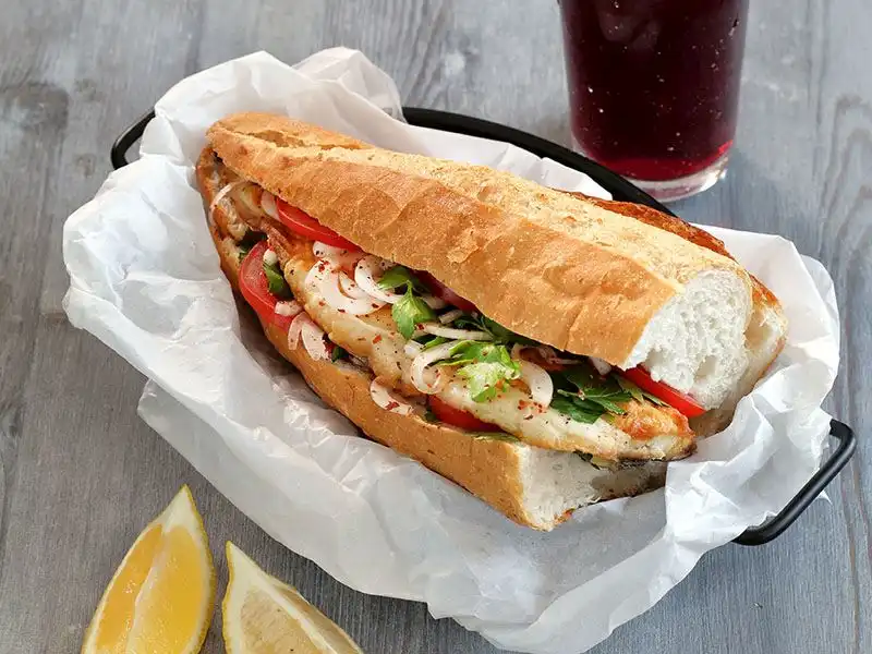 Balık ekmek: This is a fish sandwich that is made with grilled fish, salad, and onions on a fresh bread roll. 
