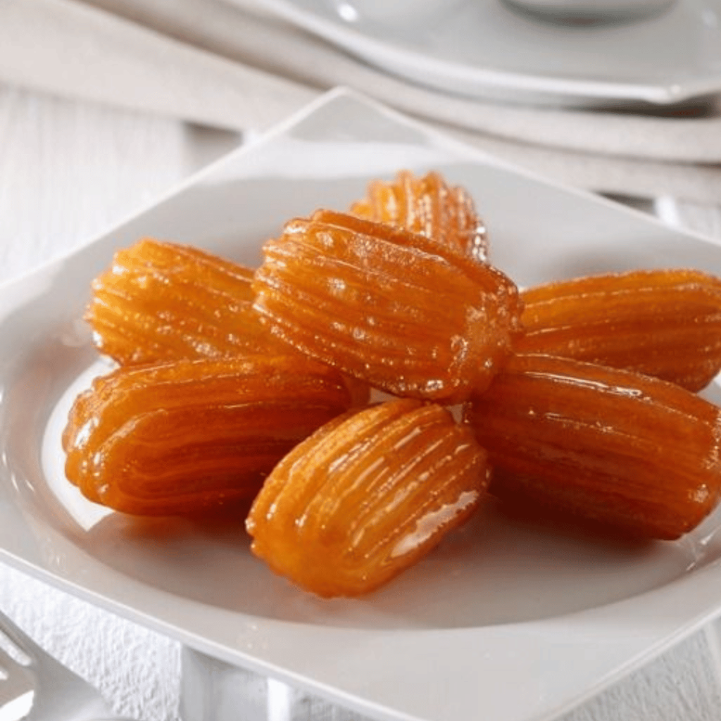 Tulumba: Deep-fried pastry puffs soaked in syrup, offering a delightful crunch and sweetness.
